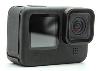 Small, palm-sized camera with a fixed lens.