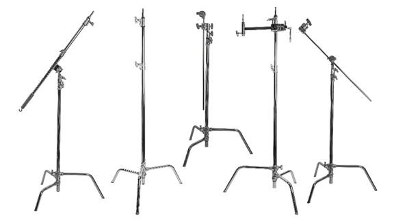 Collection of metal contraptions, each with three legs and an adjustable upper arm; is used to direct light at a certain height or angle.