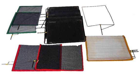 Assortment of rectangular shapes with metal framing - used to block or filter light from a shot.